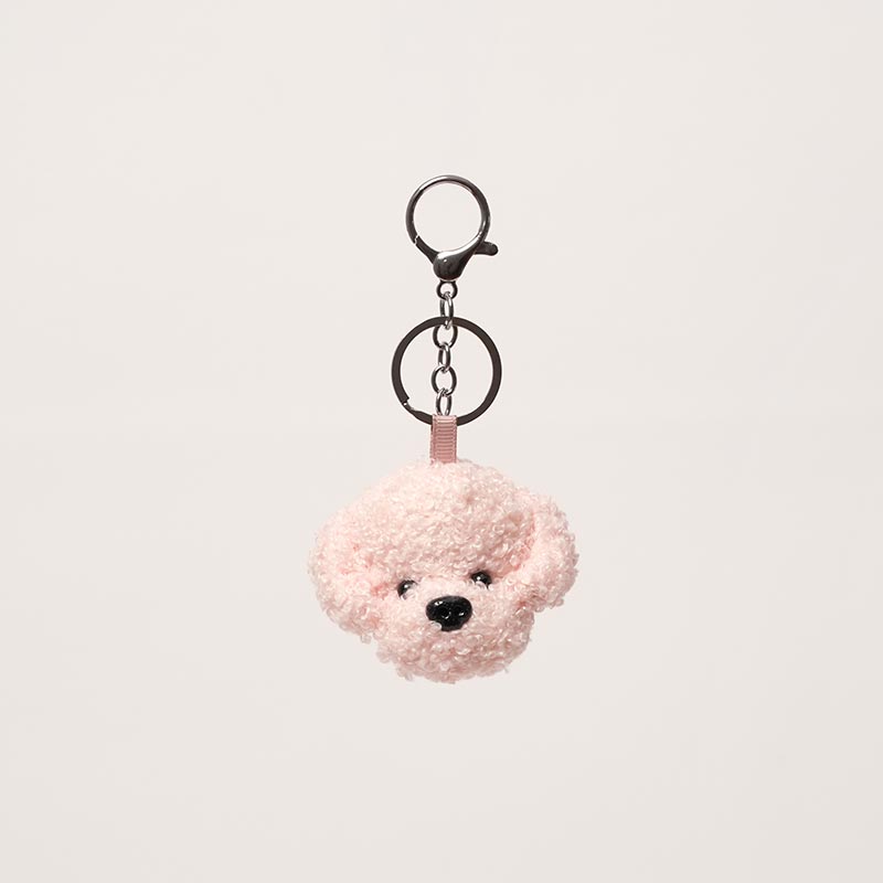 Nubioo Woof Buddy Pink colored charm. 